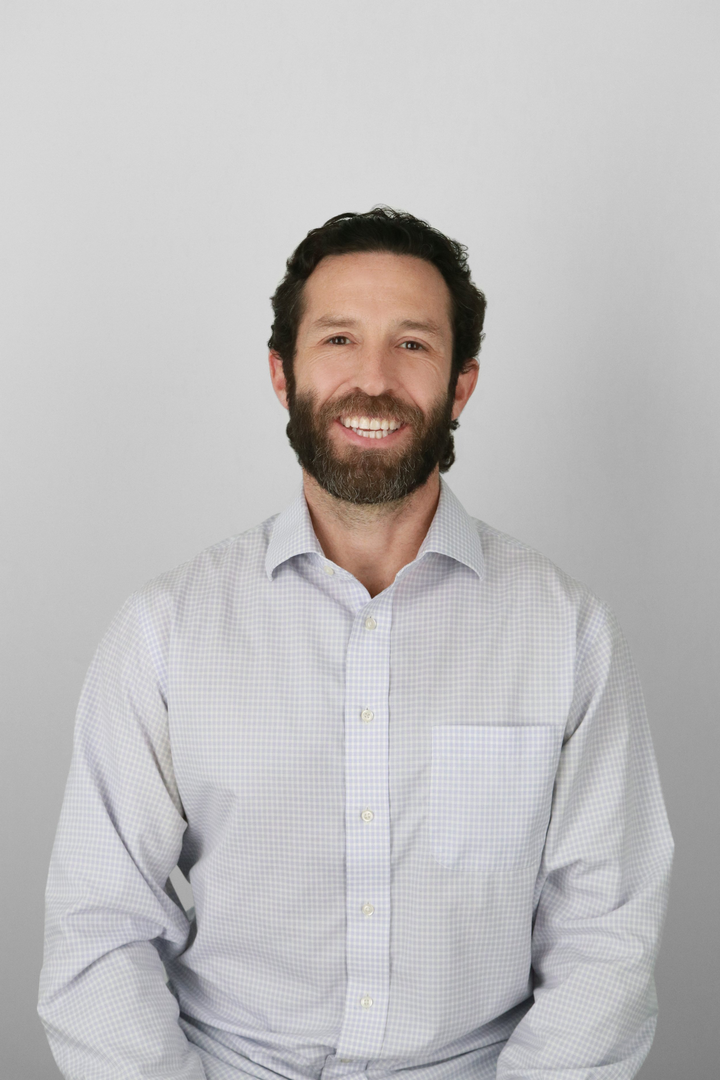 Male headshot in a shirt