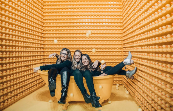 4. Photo Backdrop + Hashtag Contest - Trade Show Ideas to Attract