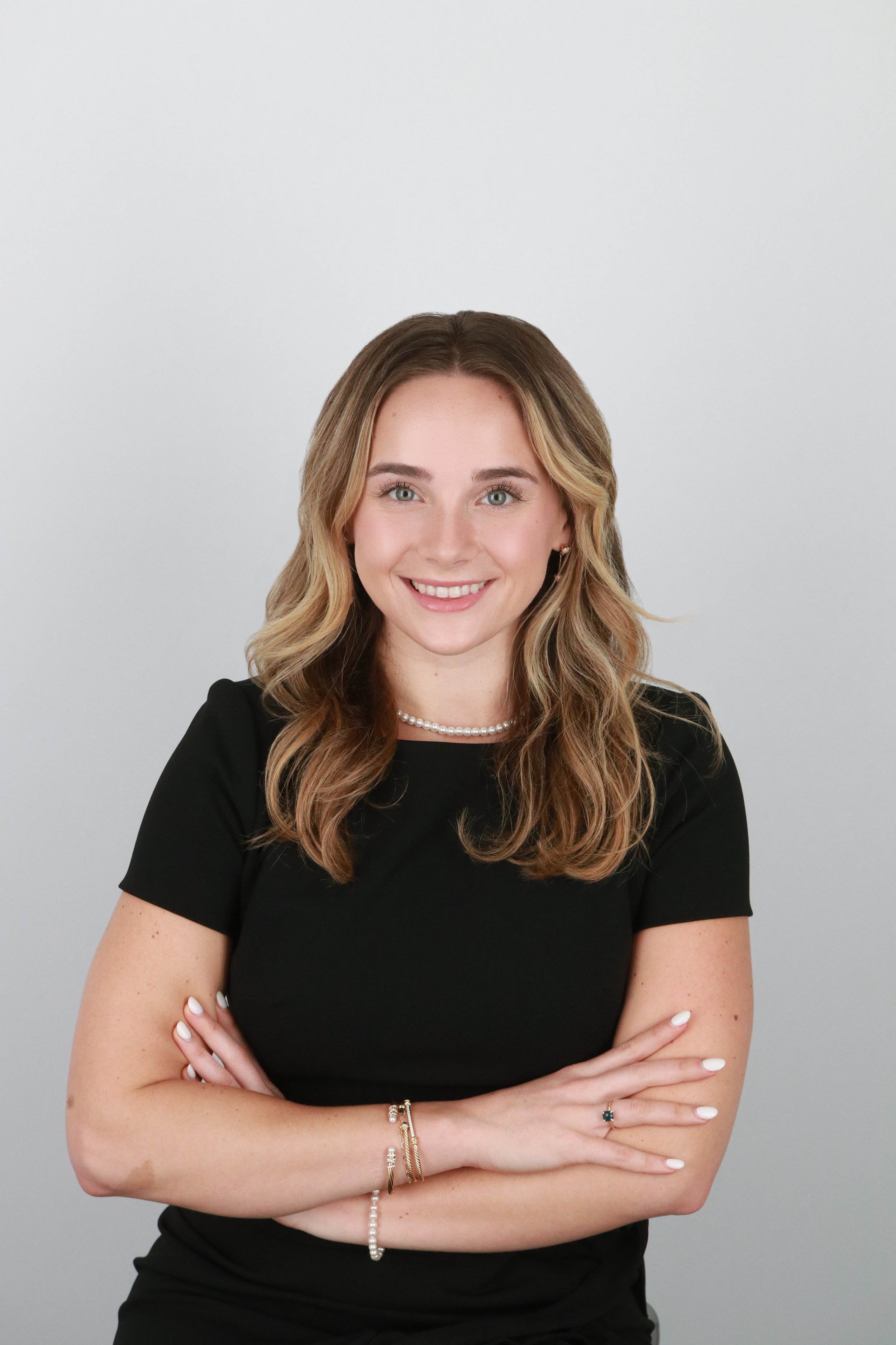 Woman's Headshot in a Black Top