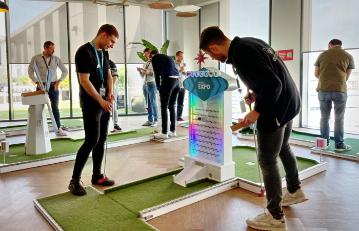 3. Mini Golf, Tabletop Games, or VR Sports Simulators - Trade Show Ideas to Attract