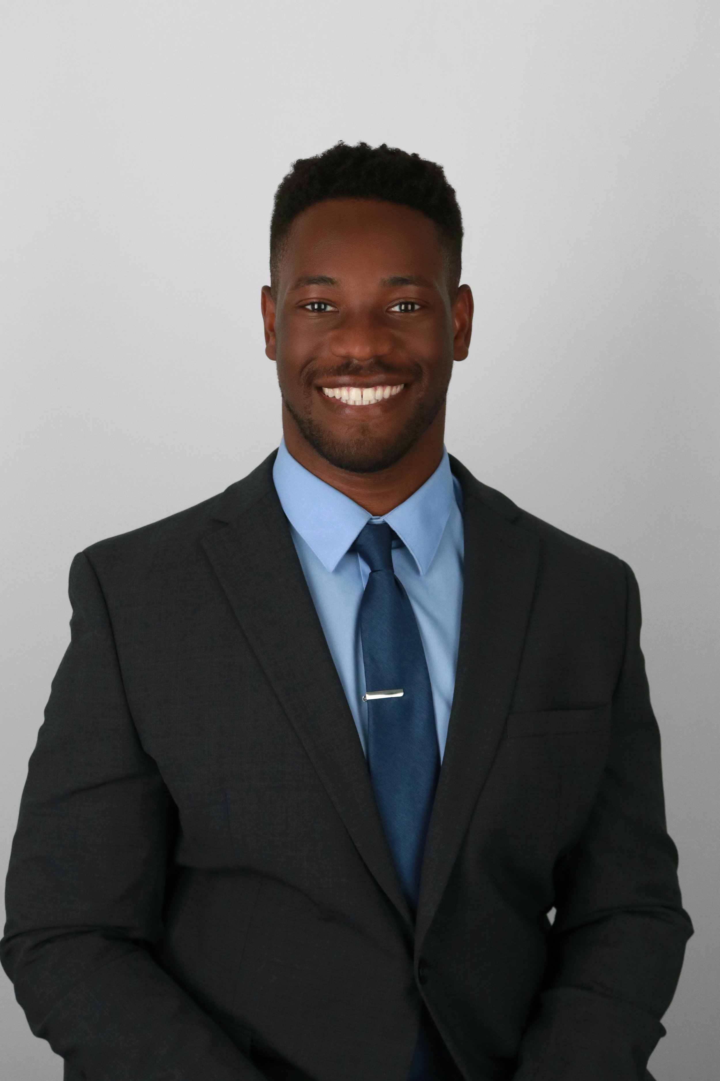 male headshot in a suit
