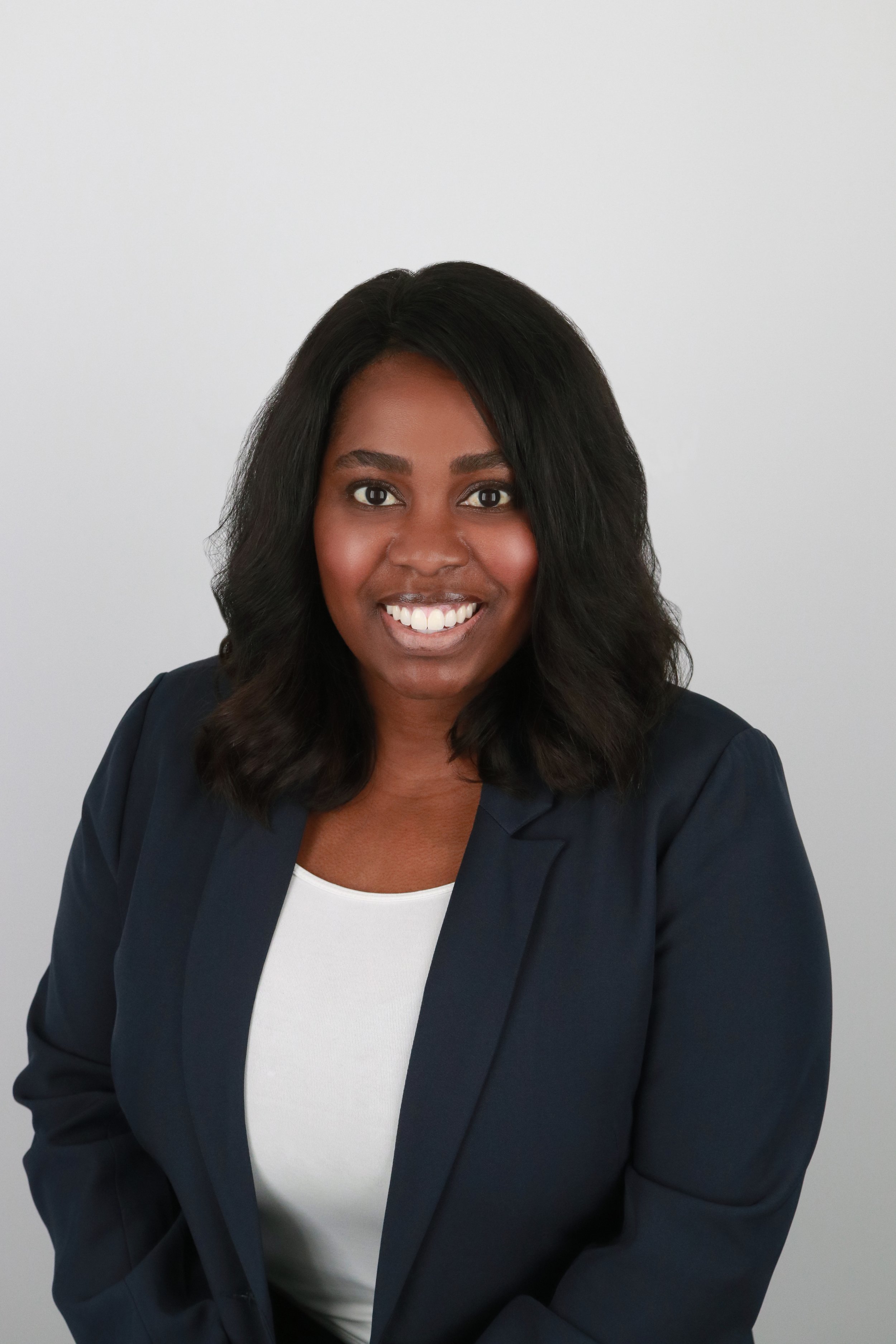 Woman's Headshot in a classic blazer