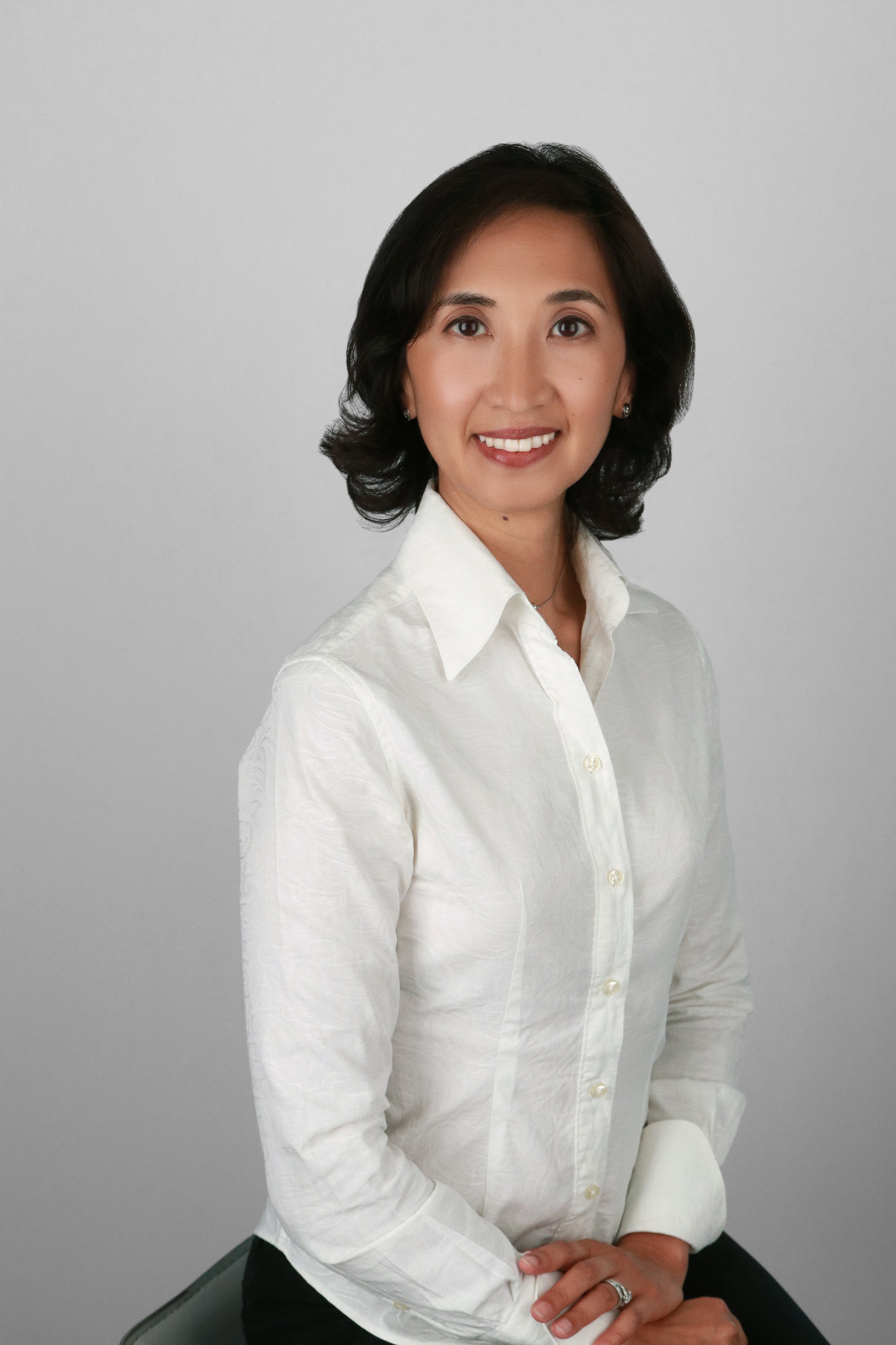 female ceo in white shirt